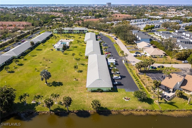 aerial view featuring a water view and a residential view