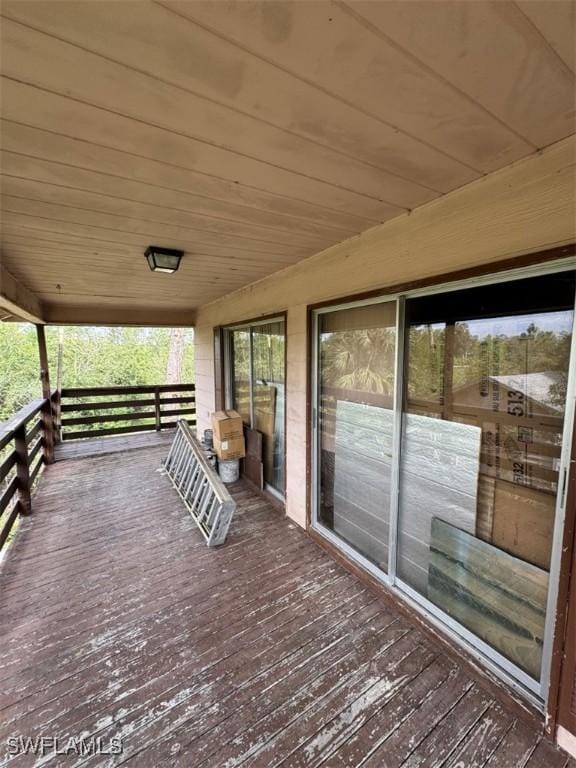 wooden deck featuring covered porch