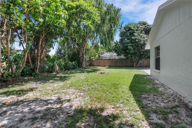 view of yard with fence