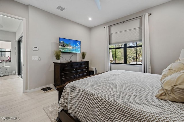 bedroom with light wood finished floors, baseboards, visible vents, ceiling fan, and recessed lighting