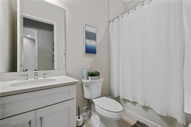 full bathroom with shower / bathtub combination with curtain, vanity, toilet, and wood finished floors