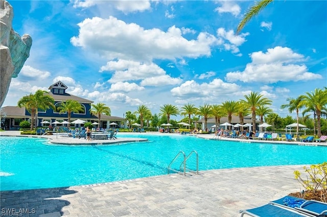 pool with a patio area