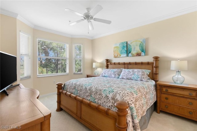 bedroom with ceiling fan, ornamental molding, baseboards, and light colored carpet