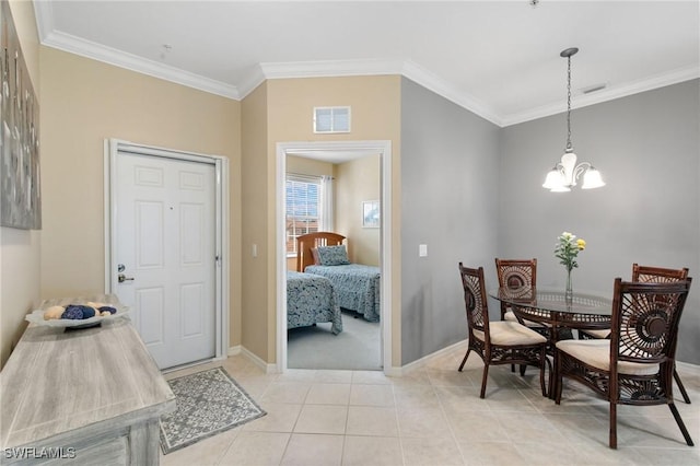 dining area with ornamental molding, visible vents, a chandelier, and light tile patterned flooring