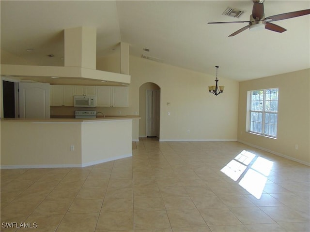 interior space featuring arched walkways, ceiling fan, high vaulted ceiling, visible vents, and baseboards