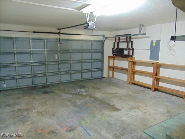 garage with electric panel and a garage door opener