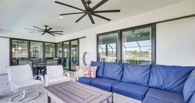 view of patio / terrace featuring an outdoor living space and a ceiling fan