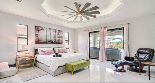 bedroom featuring access to exterior, ceiling fan, a raised ceiling, and crown molding