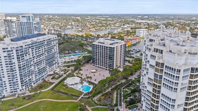 drone / aerial view featuring a water view and a city view