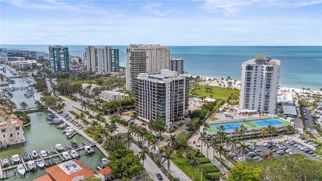 drone / aerial view with a view of city and a water view