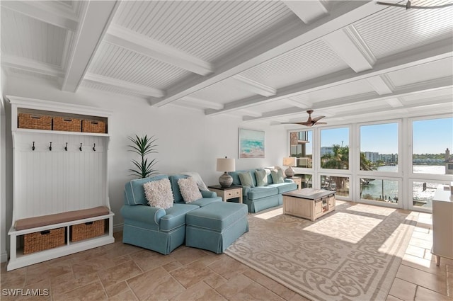 interior space featuring beamed ceiling, coffered ceiling, and a water view
