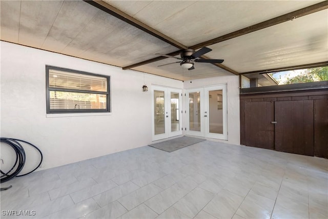 view of patio / terrace with french doors and a ceiling fan