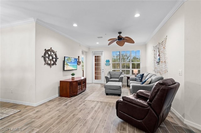 living area with crown molding, light wood-style flooring, recessed lighting, and baseboards