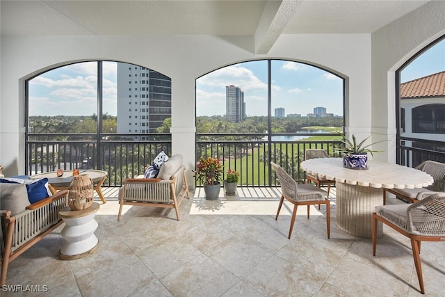 sunroom / solarium with a view of city