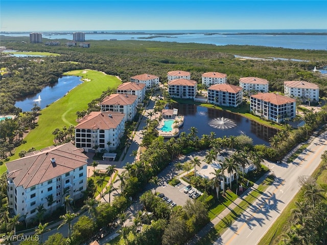 bird's eye view with a water view