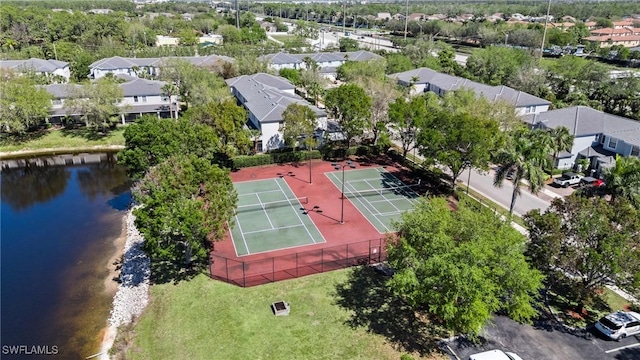 aerial view featuring a residential view and a water view