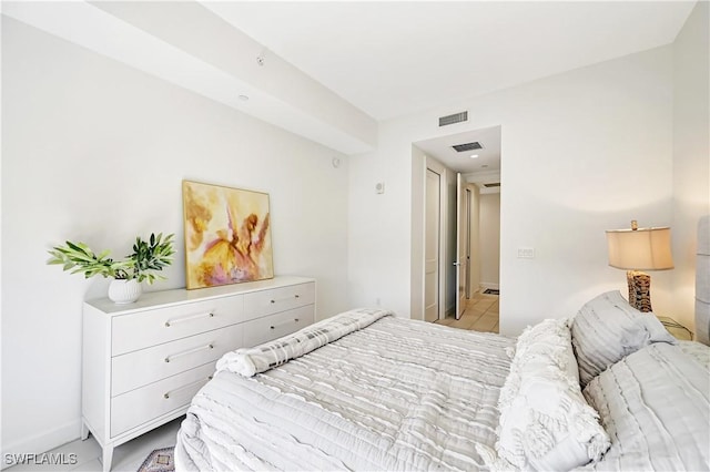 bedroom with visible vents