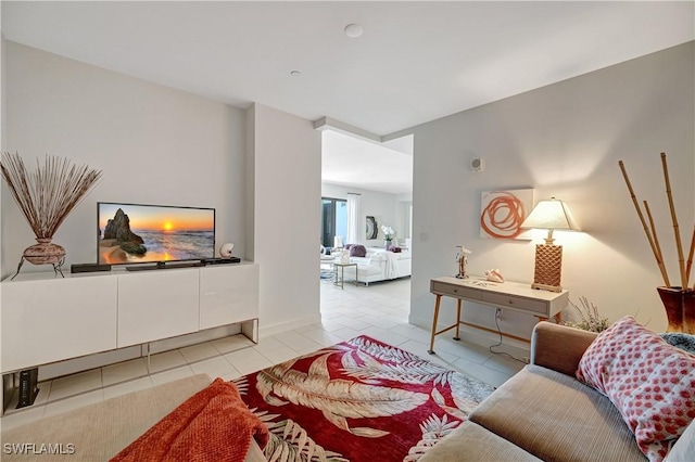 living area with light tile patterned floors