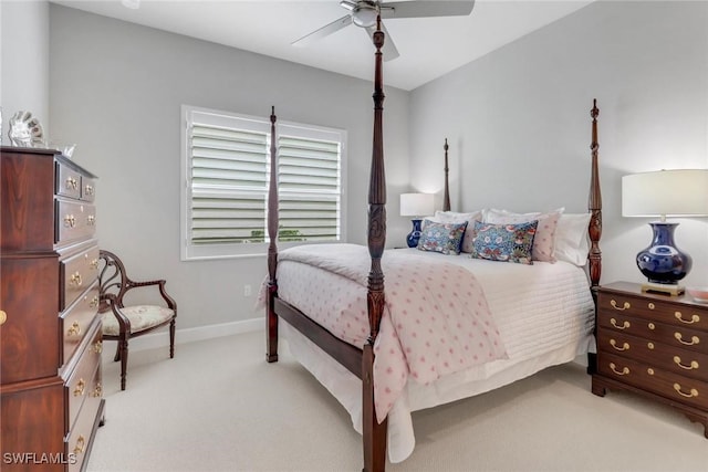 bedroom featuring ceiling fan, carpet, and baseboards