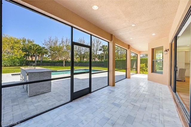 view of unfurnished sunroom