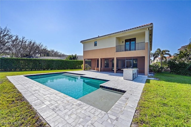 view of pool with a fenced in pool, a patio area, a lawn, and fence