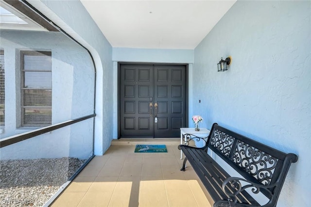 1416 SW 52nd Ter, Cape Coral, FL 33914 - doorway to property featuring stucco siding