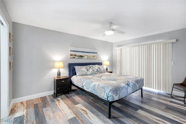 1416 SW 52nd Ter, Cape Coral, FL 33914 - bedroom featuring wood finished floors, baseboards, and a ceiling fan