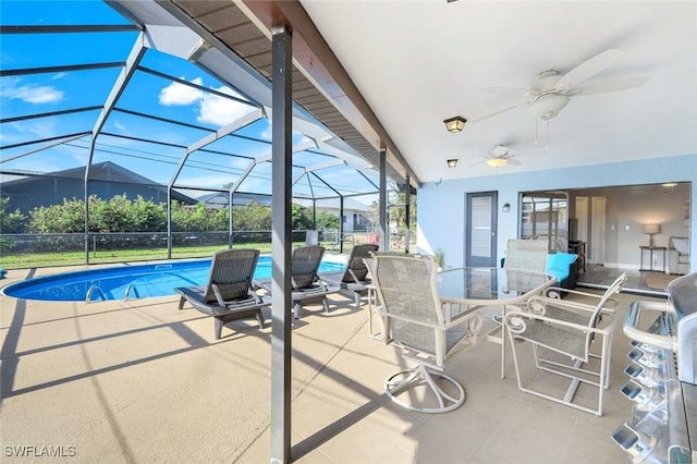 1416 SW 52nd Ter, Cape Coral, FL 33914 - view of pool with a patio area, a ceiling fan, and glass enclosure