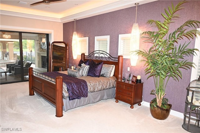 bedroom with carpet, access to outside, crown molding, and wallpapered walls