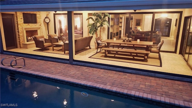 pool featuring a patio area