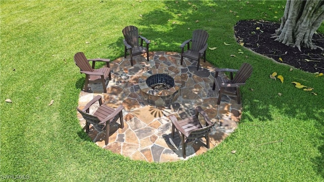 exterior space with a fire pit