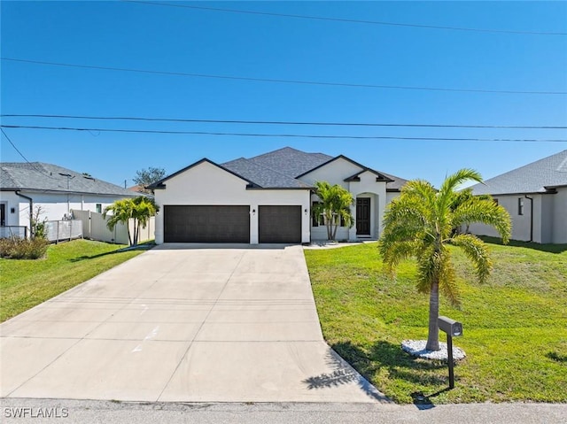 view of front of property with stucco siding, a front yard, a garage, and fence