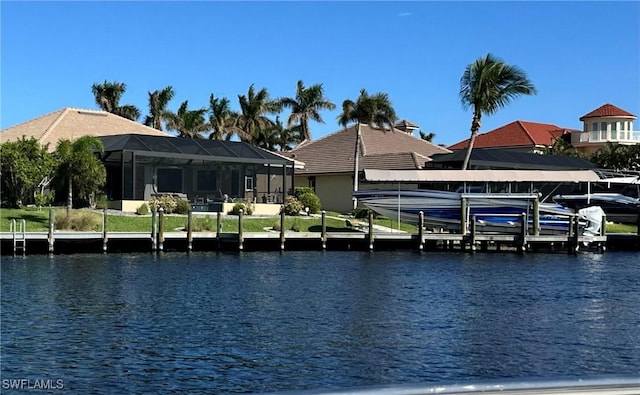 view of dock featuring a water view and boat lift