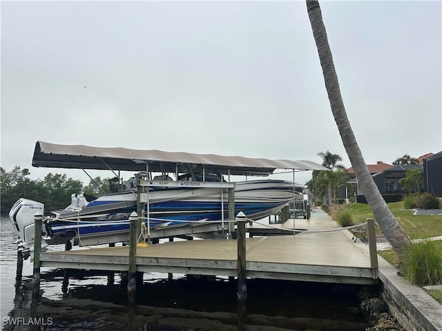 view of dock with a water view and boat lift