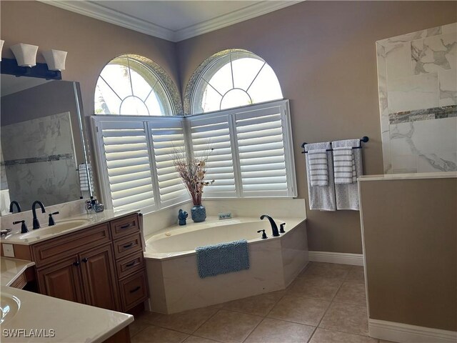 full bath with a garden tub, ornamental molding, vanity, tile patterned flooring, and baseboards