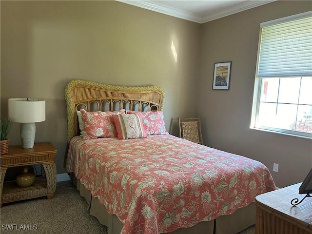 bedroom with carpet floors and ornamental molding