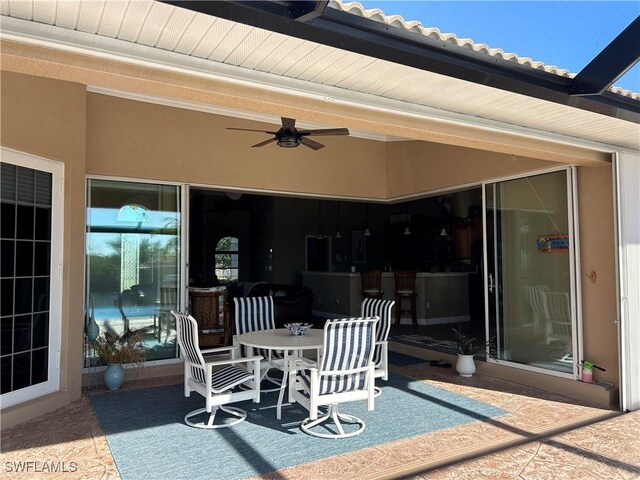 view of patio / terrace with ceiling fan