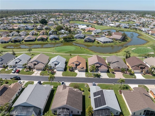 bird's eye view with view of golf course, a residential view, and a water view