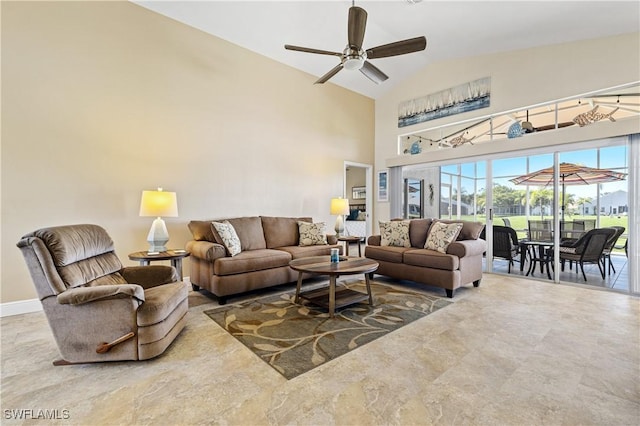 living area with baseboards, high vaulted ceiling, a ceiling fan, and a sunroom