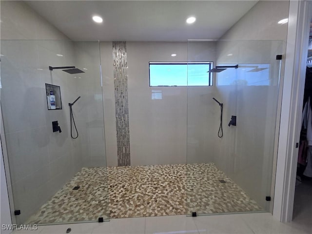 full bathroom with a stall shower and recessed lighting