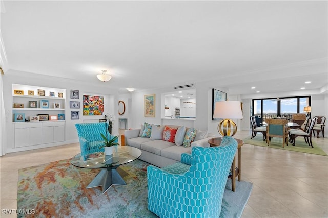 living room with recessed lighting, built in shelves, and light tile patterned floors