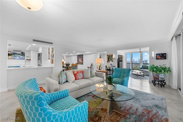 living area with tile patterned floors