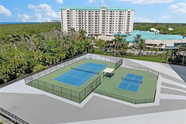 view of sport court with fence