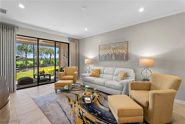 living area with light tile patterned flooring, baseboards, ornamental molding, and recessed lighting