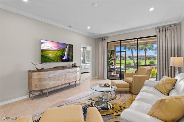 tiled living area with ornamental molding, a wealth of natural light, baseboards, and recessed lighting