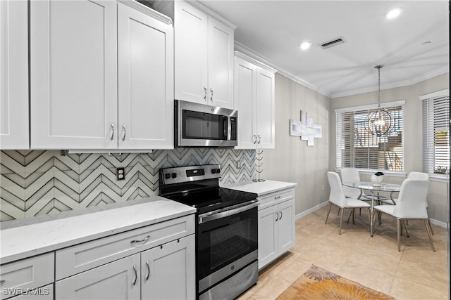 kitchen with stainless steel appliances, visible vents, backsplash, ornamental molding, and white cabinetry