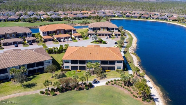 aerial view with a residential view and a water view