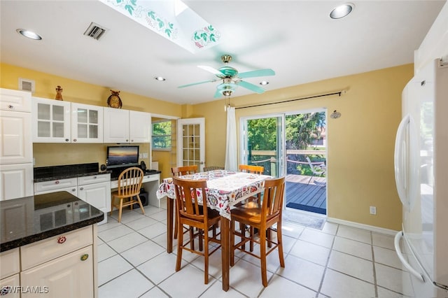 dining area with light tile patterned floors, a ceiling fan, baseboards, visible vents, and recessed lighting