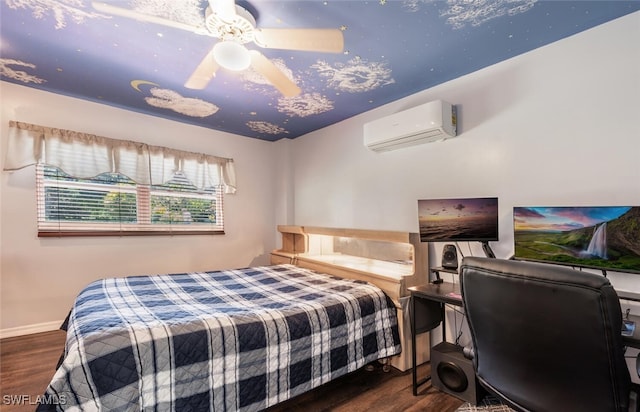 bedroom featuring an AC wall unit, wood finished floors, baseboards, and ceiling fan