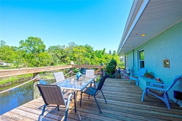 deck featuring outdoor dining space